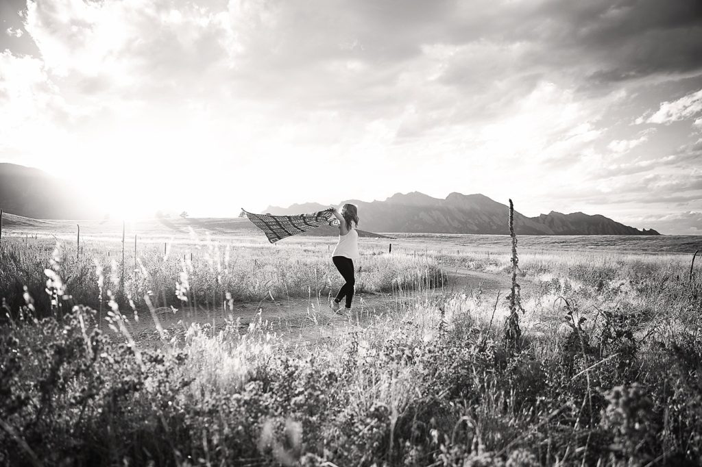 Leighellen_Landksov_Photography_Boulder_Colorado_Senior_Pictures_Girl_Dancing_Mountains_Field_sunset_B&W_0016